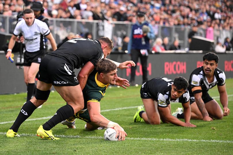 CHRISTCHURCH, NEW ZEALAND - OCTOBER 27: Zac Lomax of Australia scores a try during the men's 2024 Rugby League Pacific Championships match between New Zealand Kiwis and Australian Kangaroos at Apollo Projects Stadium on October 27, 2024 in Christchurch, New Zealand. (Photo by Joe Allison/Getty Images)