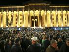 Demonstrators gather at the Georgian Parliament building during an opposition protest against the results of the parliamentary election in Tbilisi, Georgia.