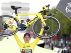 Jonas Vingegaard celebrates on the Champs-Elysees podium after winning the 2023 Tour de France