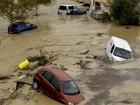 Torrential rains caused by a cold front across southeastern Spain have flooded roads and towns. (EPA PHOTO)