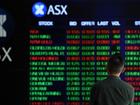 Miners, property trusts and IT shares had risen while other ASX sectors were in the red at midday. (Joel Carrett/AAP PHOTOS)