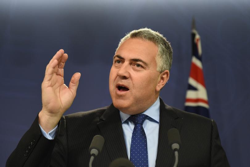 Australian Federal Treasurer Joe Hockey speaks to the media about foreign investment during a press conference at the Commonwealth Parliamentary Offices in Sydney, Tuesday, June 9, 2015. (AAP Image/Dean Lewins) NO ARCHIVING