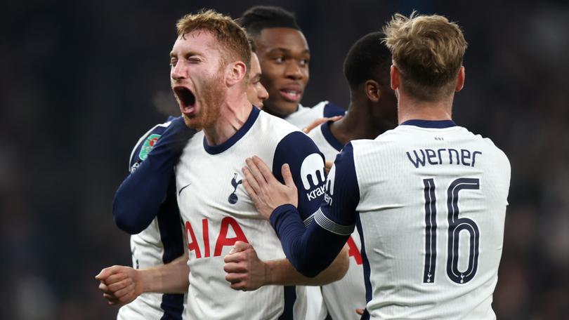 Dejan Kulusevski of Tottenham Hotspur celebrates after teammate Pape Matar Sarr scores their team's second goal during the Carabao Cup Fourth Round match between Tottenham Hotspur and Manchester City at Tottenham Hotspur Stadium.