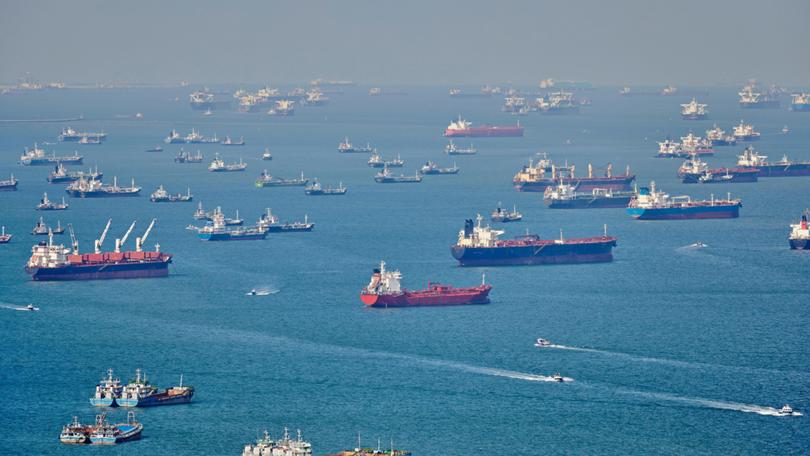 Cargo ships in the Singapore Strait waiting to dock..