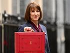 Chancellor of the Exchequer, Rachel Reeves, poses with the red Budget Box as she leaves 11 Downing Street.