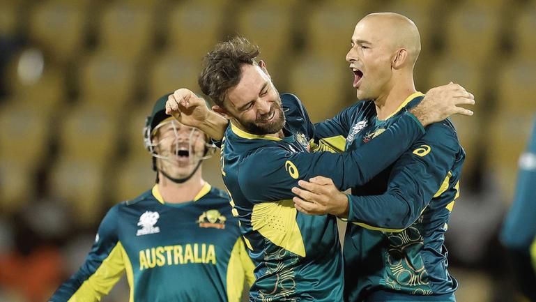 Ashton Agar celebrates with teammate Glenn Maxwell during the T20 World Cup.