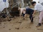 Rushing water turned narrow streets into death traps and spawned rivers that tore through homes. (EPA PHOTO)