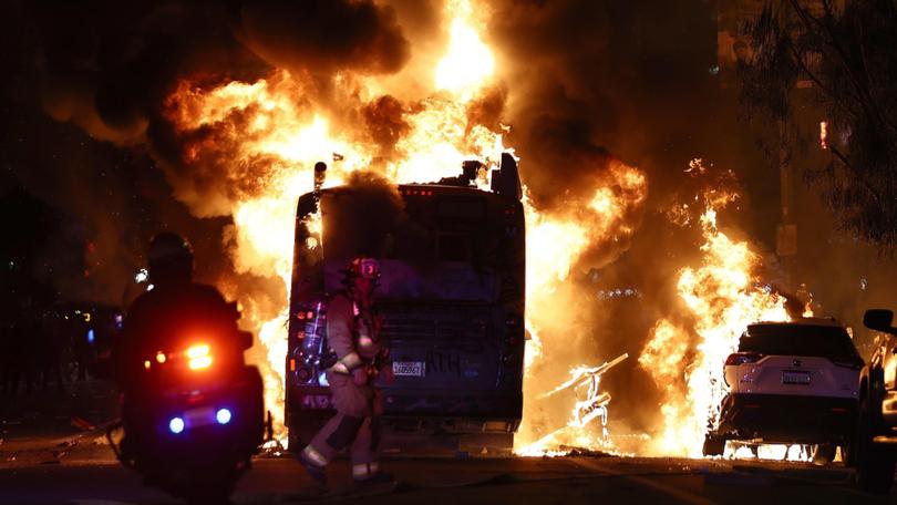 A bus set on fire by LA Dodger fans.