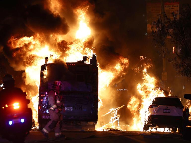 A bus set on fire by LA  Dodger fans.