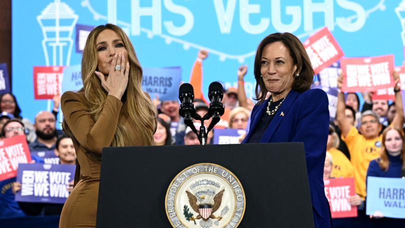 US singer Jennifer Lopez (L) greets US Vice President and Democratic presidential candidate Kamala Harris during a campaign rally in Las Vegas.