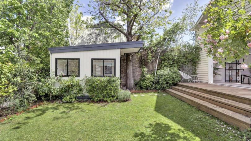 This stylish granny flat sits in the backyard of a Northcote property now on the market.