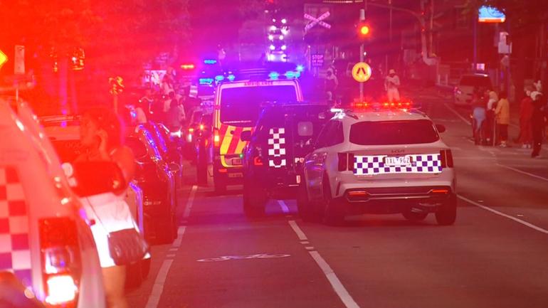 Police have set up a crime scene in North Melbourne after a man was shot in the early hours. (Joel Carrett/AAP PHOTOS)