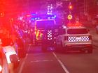 Police have set up a crime scene in North Melbourne after a man was shot in the early hours. (Joel Carrett/AAP PHOTOS)