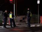 A car has smashed through a construction site in Melbourne.