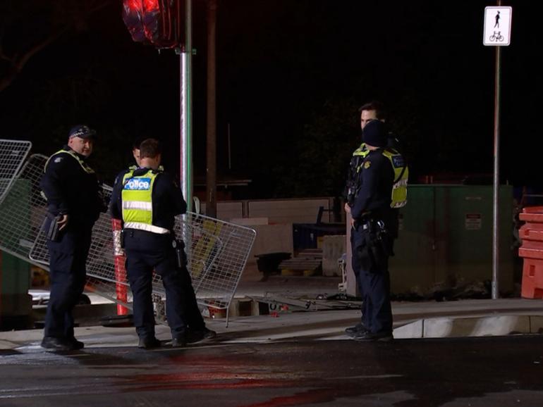 A car has smashed through a construction site in Melbourne.