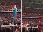 Chris Martin was talking to fans when he took the unexpected tumble. 