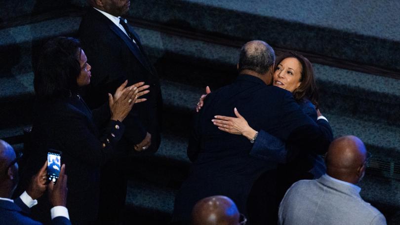 Vice President Kamala Harris greets parishioners at the Greater Emmanuel Institutional Church of God in Christ in Detroit on Sunday. 