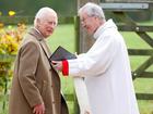 King Charles III with The Reverend Canon Dr Paul Williams, at Sunday service at Sandringham estate.