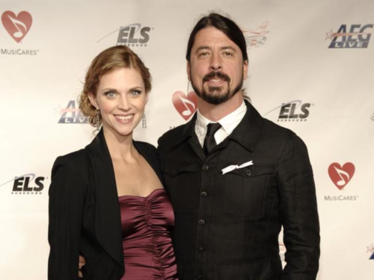 An insider says Dave Grohl's wife Jordyn knew about his affair and lovechild long before the public. (AP PHOTO)