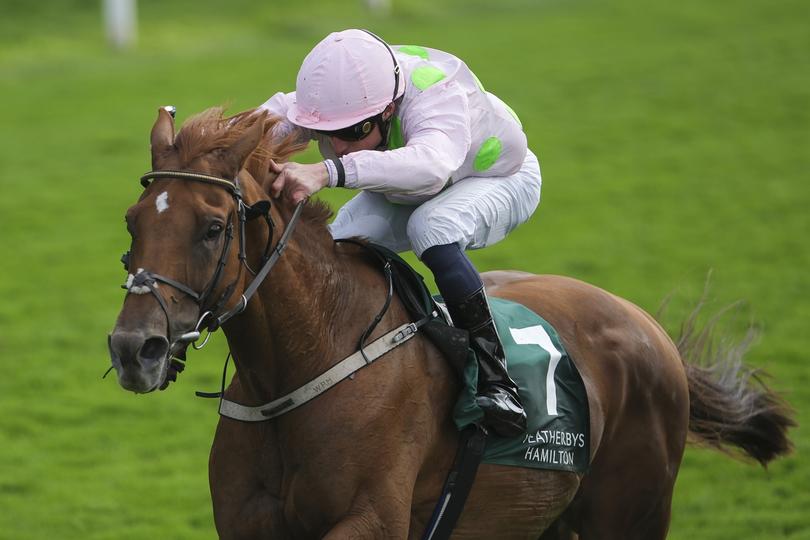 YORK, ENGLAND - AUGUST 23: William Buick riding Vauban (pink/green spots) win The Weatherbys Hamilton Lonsdale Cup Stakes at York Racecourse on August 23, 2024 in York, England. (Photo by Alan Crowhurst/Getty Images)