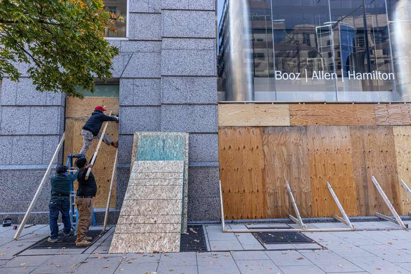 An office building on I Street is boarded up. 