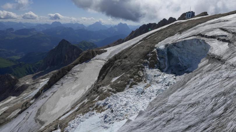 Three men and a woman have died after falling from mountain peaks in the Italian Alps. (AP PHOTO)