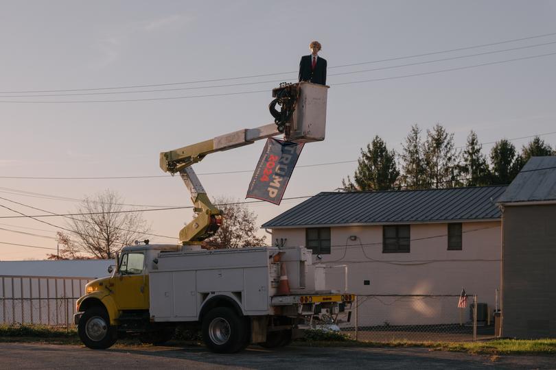 A mannequin resembling Donald Trump was placed in a boom lift above a Trump 2024 flag in Shrewsbury, Pennsylvania. 