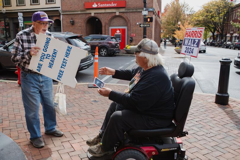 Wickenheiser argues with a supporter of former president Donald Trump. 