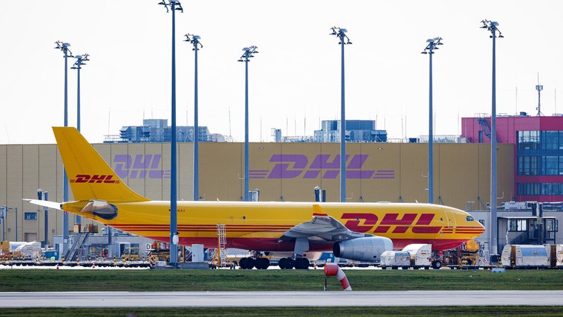 A DHL cargo plane on the tarmac at Leipzig/Halle Airport on October 15, 2024 in Schkeuditz, Germany.