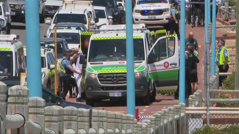 An off-duty police officer has died at Trigg Beach in Perth.