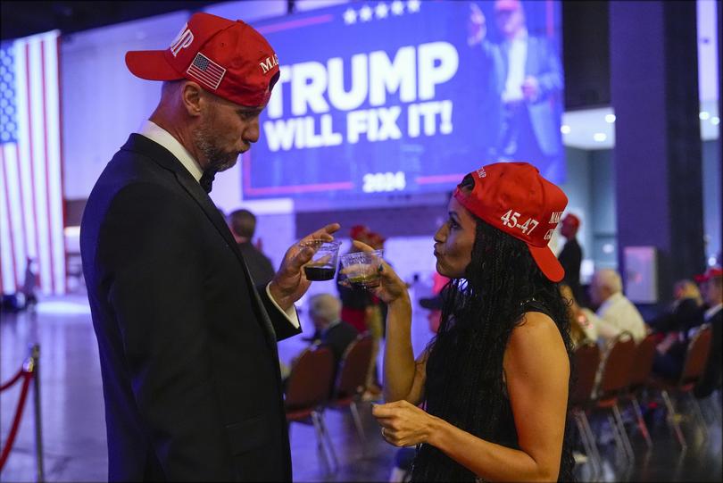 Supporters arrive at an election night watch party for Republican presidential nominee former President Donald Trump Tuesday, Nov. 5, 2024, in West Palm Beach, Fla. (AP Photo/Julia Demaree Nikhinson)