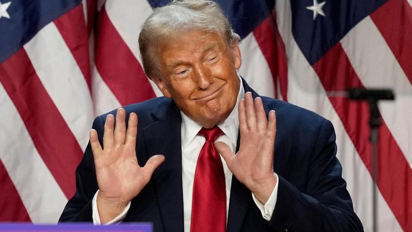 Republican presidential nominee former President Donald Trump dances after speaking at an election night watch party. 