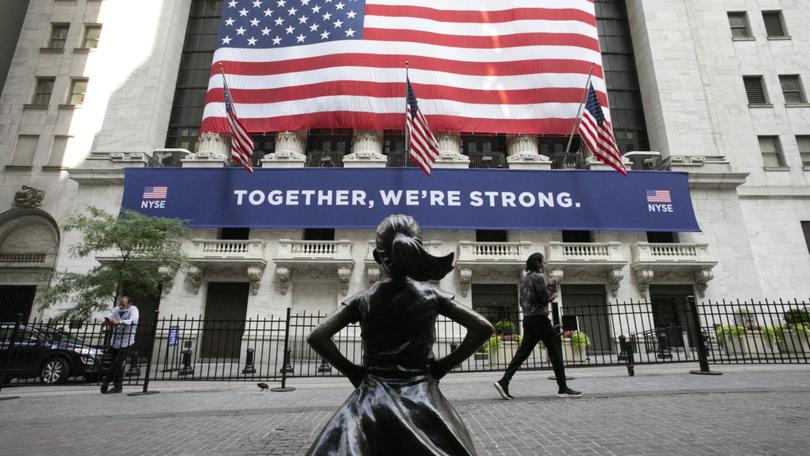 The Fearless Girl statue stands in front of the New York Stock Exchange in New York. 