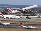 A man has been charged over an alleged assault after a bag fell on his head from the overhead baggage compartment while passengers were disembarking a flight from NZ to Sydney. File image