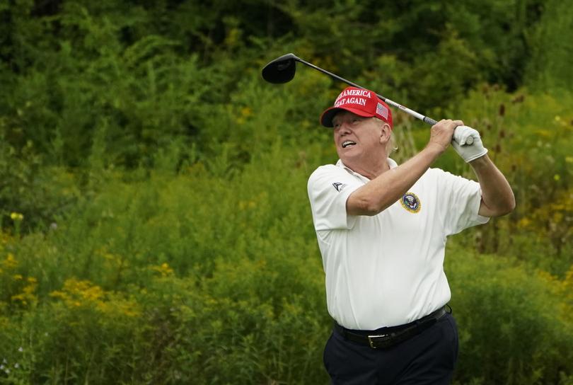 Former US President and 2024 Presidential hopeful Donald Trump plays golf during the Official Pro-Am Tournament ahead of the LIV Golf Invitational Series event at Trump National Golf Club Bedminster in Bedminster, New Jersey, on August 10, 2023. The LIV Golf Invitational Bedminster begins on August 11. (Photo by TIMOTHY A. CLARY / AFP)