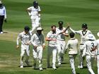 Michael Neser (c) is congratulated by teammates after causing havoc and destruction against India A. (James Ross/AAP PHOTOS)