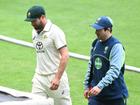 A hobbling Michael Neser leaves the field mid-over after wreaking havoc against India A. (James Ross/AAP PHOTOS)