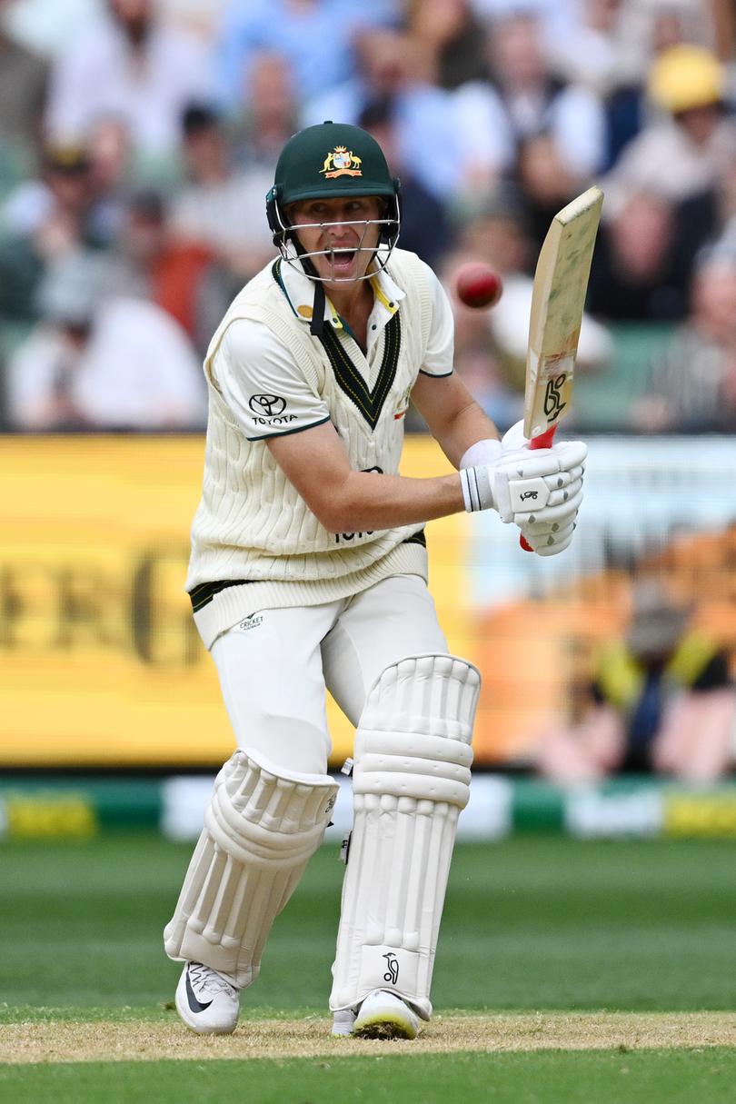 MELBOURNE, AUSTRALIA - DECEMBER 26: Marnus Labuschagne of Australia reacts after playing a shot during day one of the Second Test Match between Australia and Pakistan at Melbourne Cricket Ground on December 26, 2023 in Melbourne, Australia. (Photo by Quinn Rooney/Getty Images)