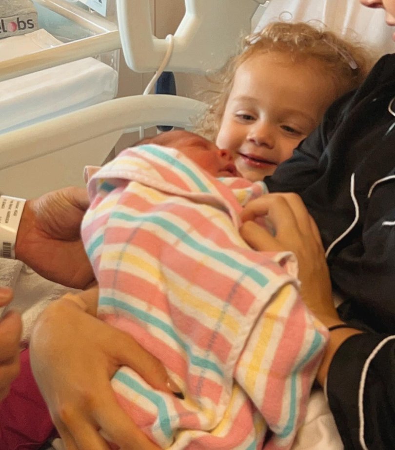 Milla meeting her brother for the first time.