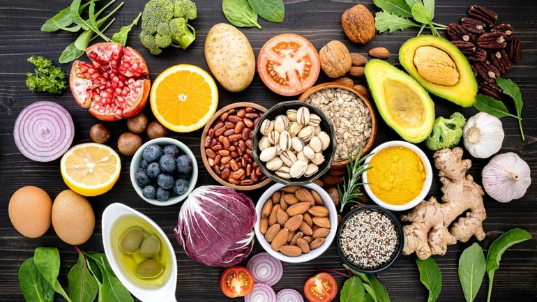 Ingredients for the healthy foods selection. The concept of healthy food set up on wooden background.