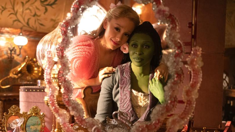 L to R: Ariana Grande is Glinda and Cynthia Erivo is Elphaba in WICKED, directed by Jon M. Chu