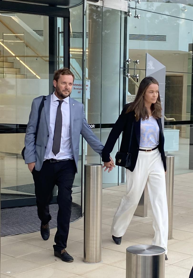 Tobias Moran leaving court with wife Samantha.