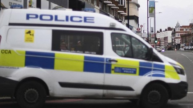 A teenage girl was killed when she got out of a police car on a motorway in Somerset.
