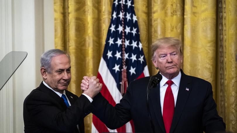 President Donald Trump and Israeli Prime Minister Benjamin Netanyahu announce an Israeli-Palestinian peace proposal at the White House on Jan. 28, 2020. (MUST CREDIT: Jabin Botsford/The Washington Post)