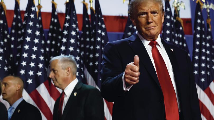 WEST PALM BEACH, FLORIDA - NOVEMBER 06:  Republican presidential nominee, former U.S. President Donald Trump arrives to speak during an election night event at the Palm Beach Convention Center on November 06, 2024 in West Palm Beach, Florida. Americans cast their ballots today in the presidential race between Republican nominee former President Donald Trump and Vice President Kamala Harris, as well as multiple state elections that will determine the balance of power in Congress.   (Photo by Chip Somodevilla/Getty Images)