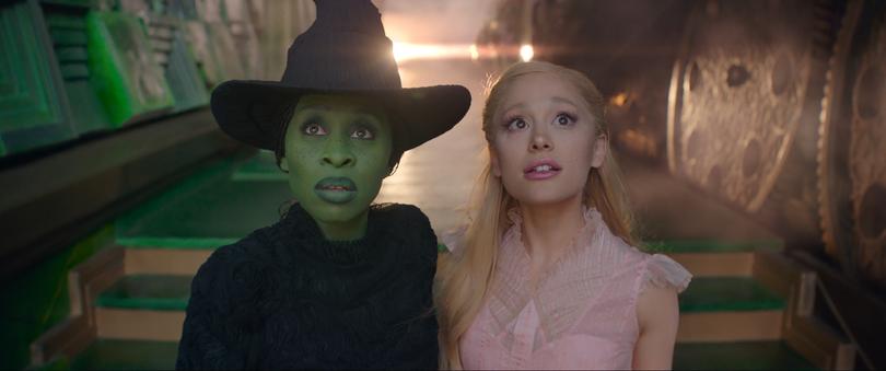 L to R: Cynthia Erivo is Elphaba and Ariana Grande is Glinda in WICKED, directed by Jon M. Chu