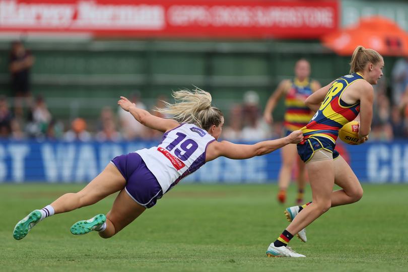 Hayley Miller tries to tackle Brooke Tonon.