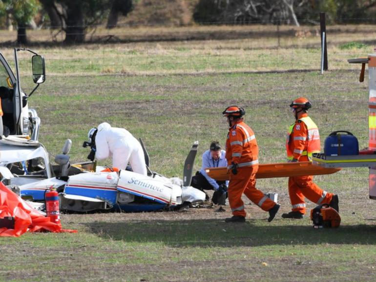 A pilot and his two teenage passengers died when the light aircraft crashed into a paddock. (James Ross/AAP PHOTOS)