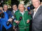 Alan Jones (centre) departs the Day St Police Station, in Sydney, Monday, November 18, 2024. Veteran radio broadcaster Alan Jones, 83, has been arrested over indecent assault and sexual touching allegations spanning two decades. (AAP Image/Bianca De Marchi) NO ARCHIVING