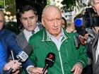 Alan Jones (centre) departs the Day St Police Station, in Sydney, Monday, November 18, 2024. Veteran radio broadcaster Alan Jones, 83, has been arrested over indecent assault and sexual touching allegations spanning two decades. (AAP Image/Bianca De Marchi) NO ARCHIVING